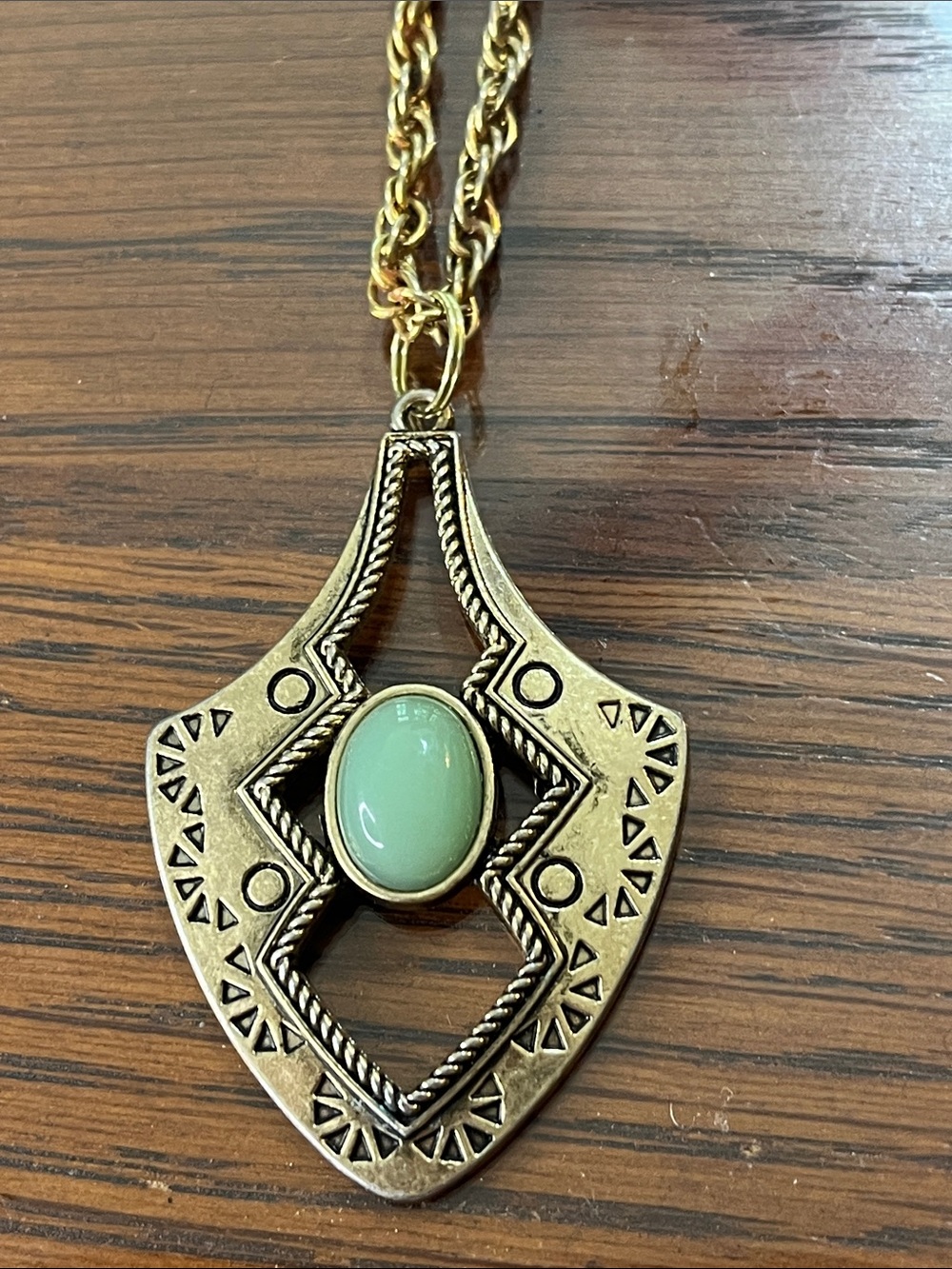 Vintage-Inspired Gold Tone Pendant Necklace with Green Stone